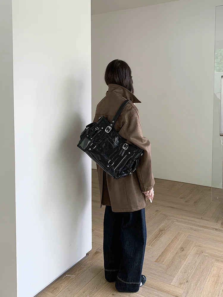 Between Departures Shoulder Bag