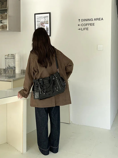 Between Departures Shoulder Bag